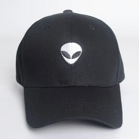 Black cotton satin weave baseball cap with embroidered alien head and green label