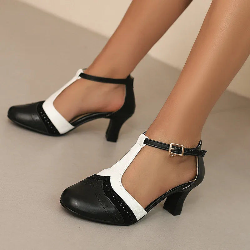 Women's retro closed toe chunky heel sandals in black with buckle fastening and round toe
