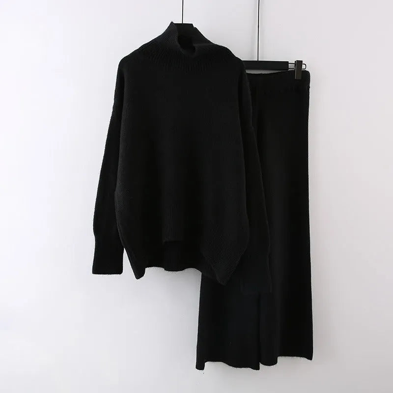 Women's casual two-piece set showing sweater and wide leg trousers in solid colour with thread detail