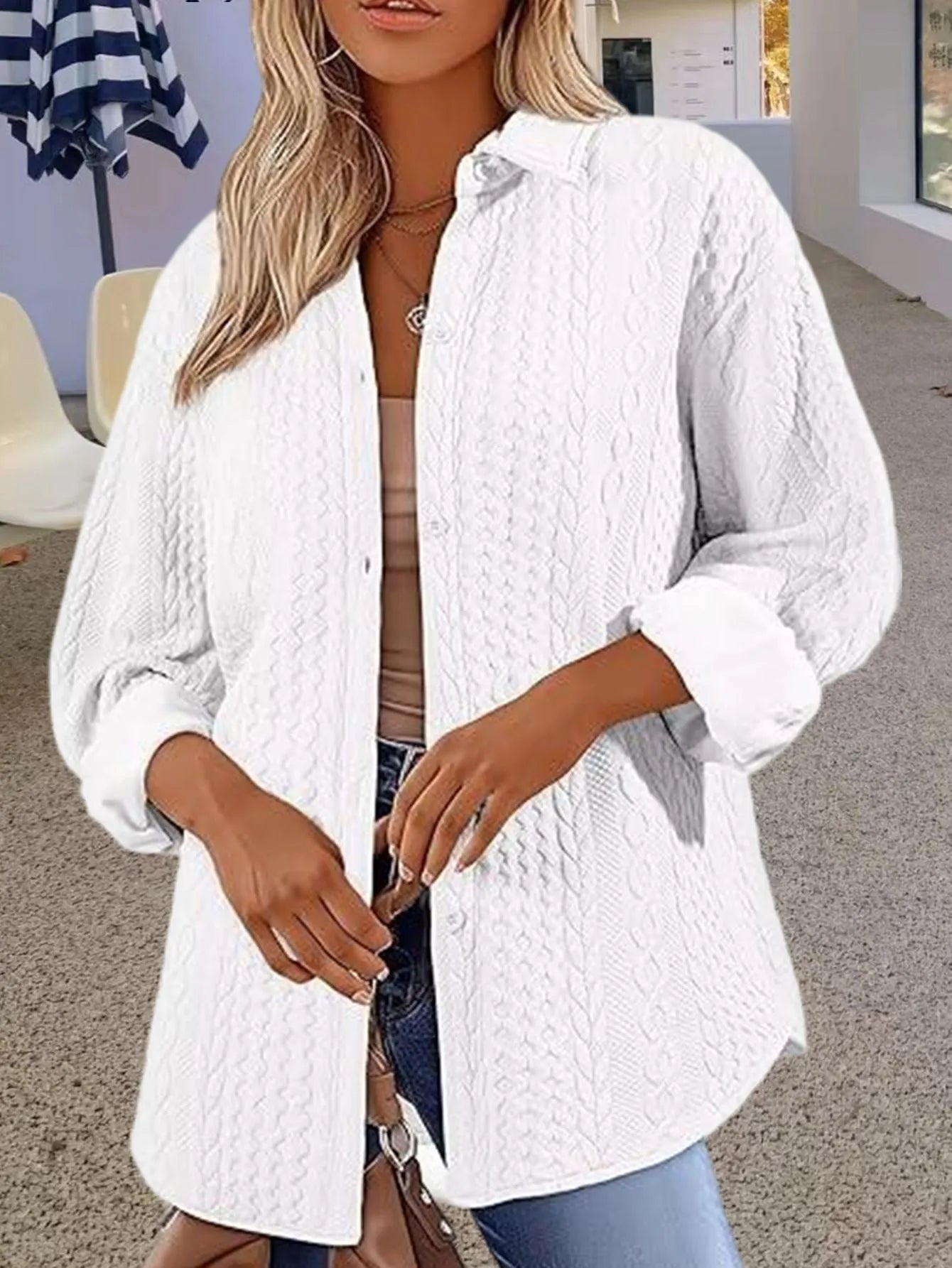 Women's solid colour knitted polyester cardigan sweater in black shown front view