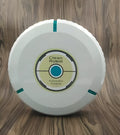 Black or white ABS plastic robot vacuum cleaner on a hardwood floor.