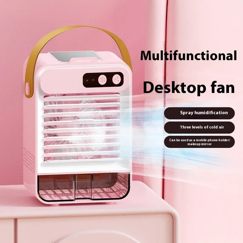Dark green compact USB desk fan with five blades on a desktop, showing touch controls and portable design.