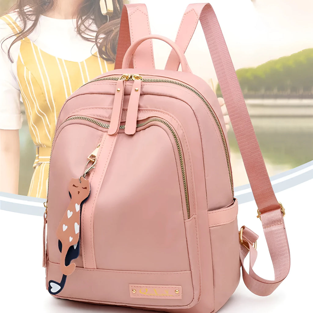 Women's casual backpack in black or pink with 20L capacity, waterproof nylon construction, and internal organiser compartments
