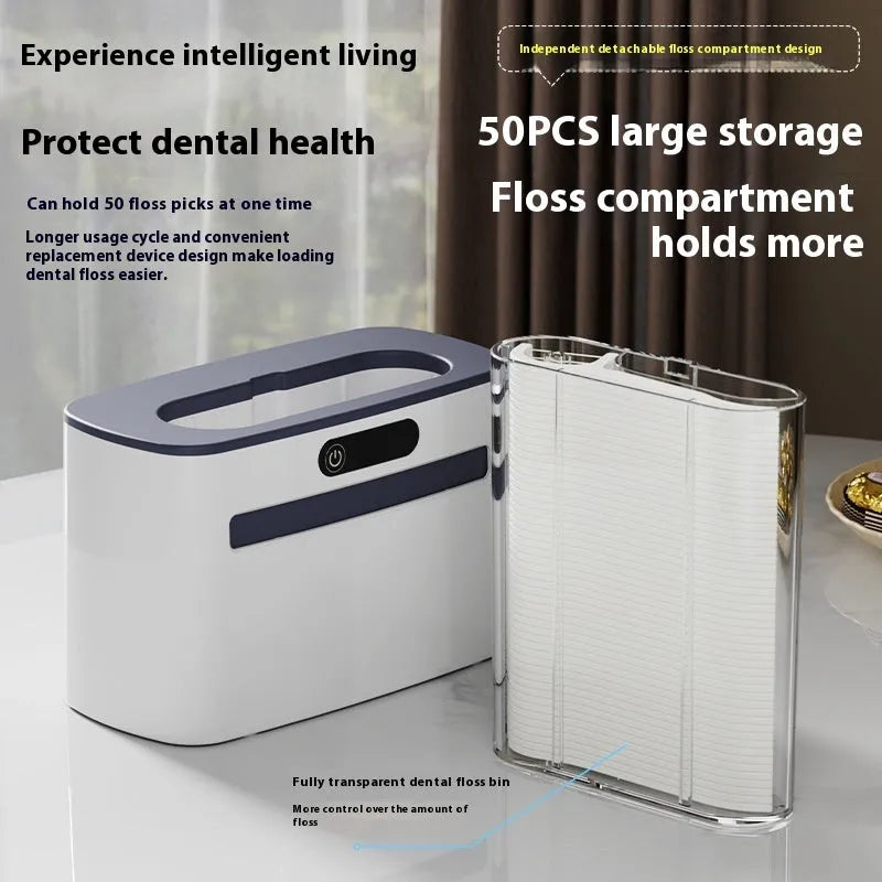 Electric dental floss box in dark grey, light grey or gold with automatic pop-up mechanism