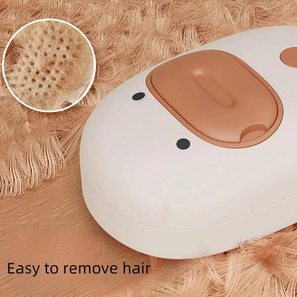 White and yellow rechargeable steam brush for grooming cats and dogs on a plain background