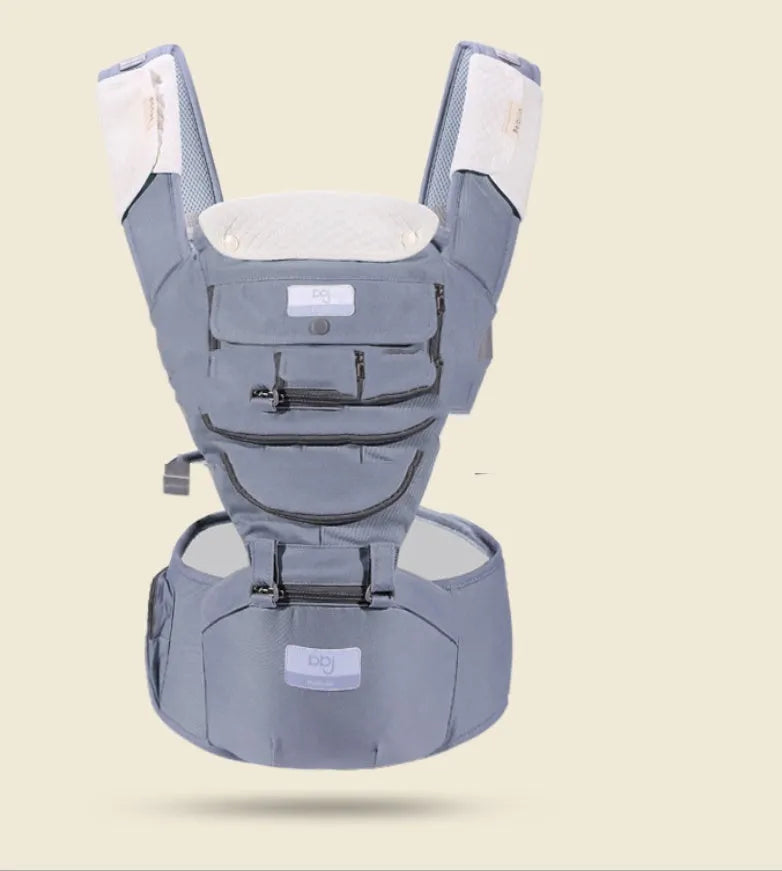Breathable baby hip seat carrier in mint green with adjustable shoulder strap and waist stool
