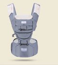 Breathable baby hip seat carrier in mint green with adjustable shoulder strap and waist stool