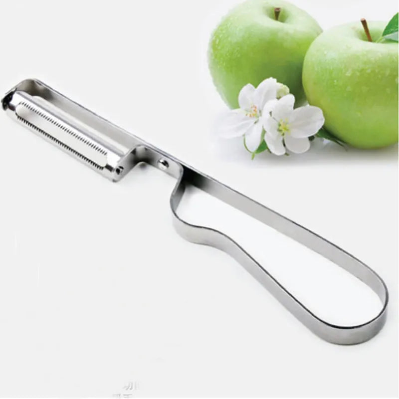 Silver stainless steel fruit and vegetable peeler on a clean kitchen counter