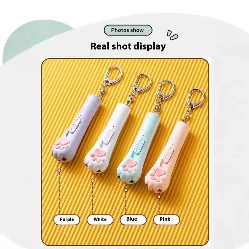 Colourful cat teaser wand toy with feather attachment and pen light charger for interactive play.