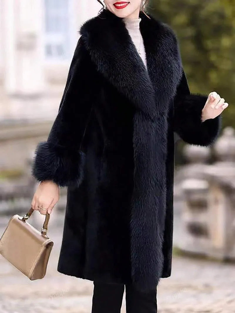 Women's grey thick faux rabbit fur mid-length coat with a fur collar on a hanger.