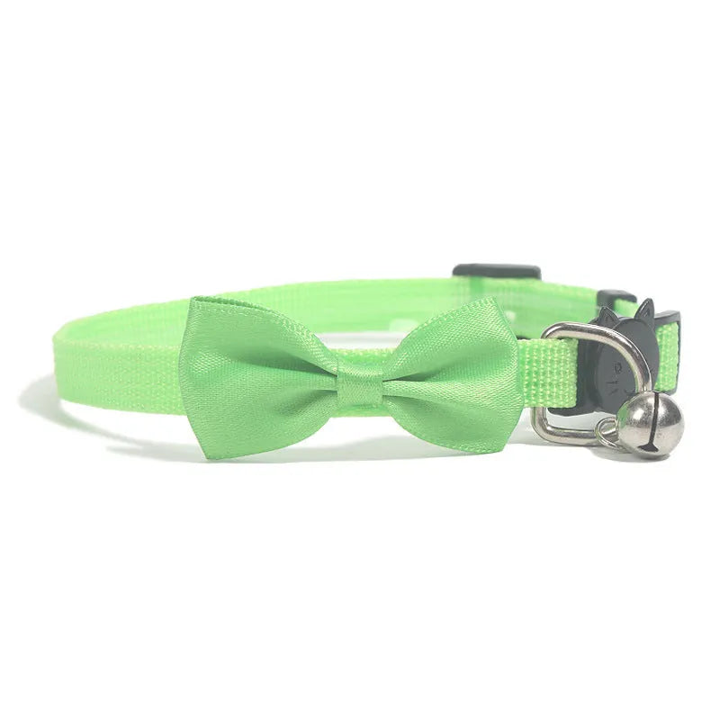 Striped multi-colour adjustable nylon cat collar with a small bell attached.