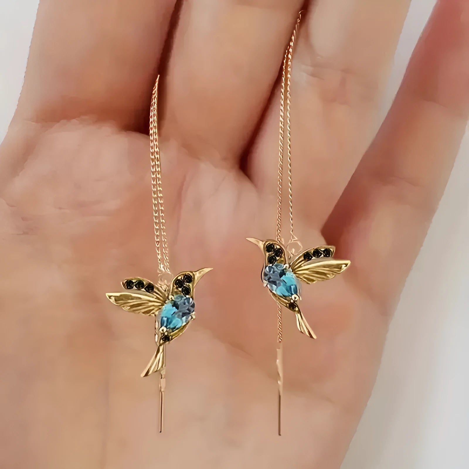 Long drop bird charm earrings in alloy with zircon detailing, available in blue, red, and red lvzuan.