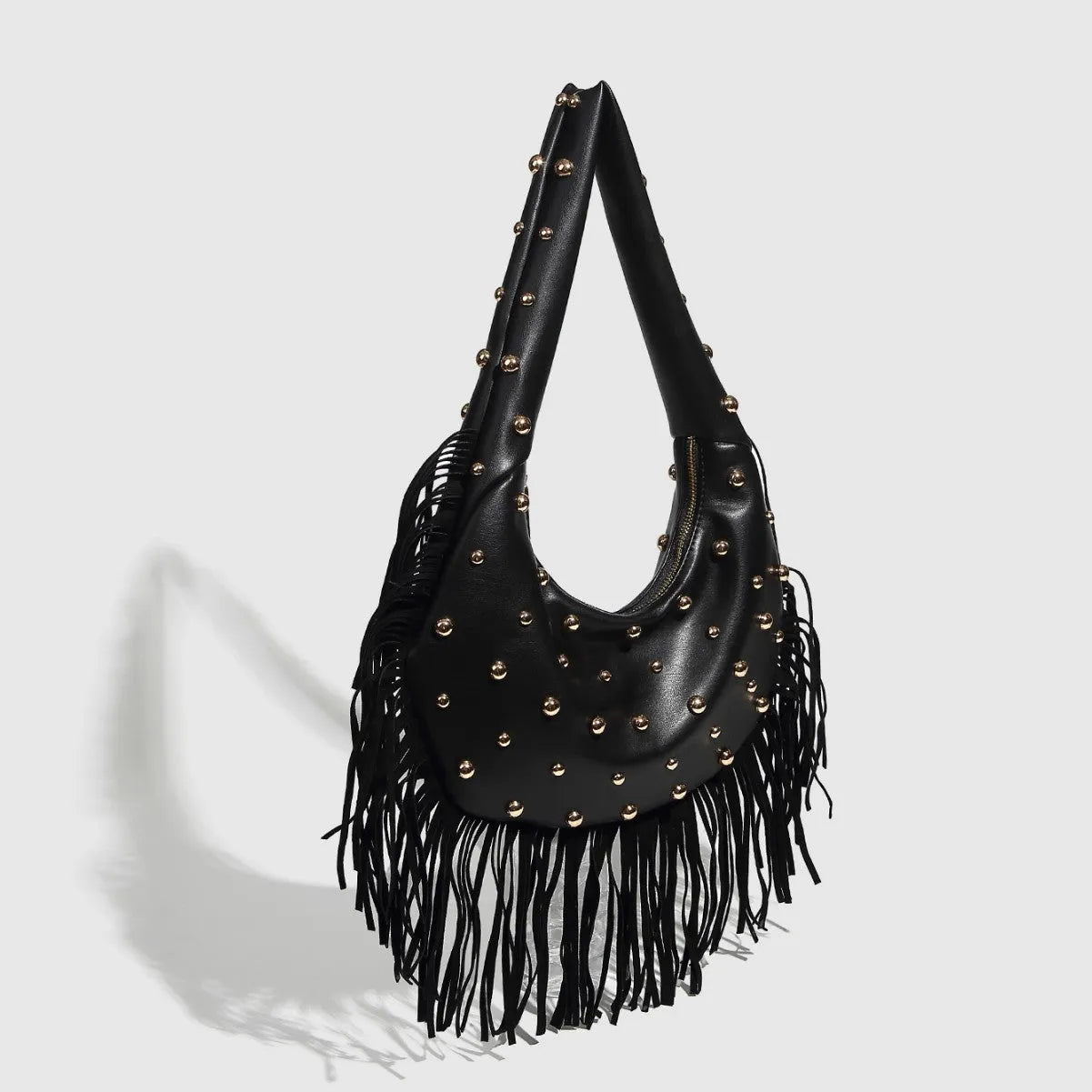 Retro black shoulder handbag with tassel detailing and mobile phone compartment