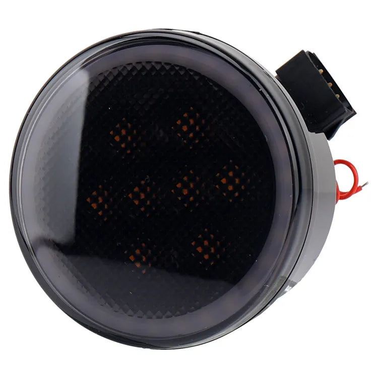 Pair of yellow LED turn signal lights mounted in Jeep Wrangler JK centre grille with ABS polymer housing
