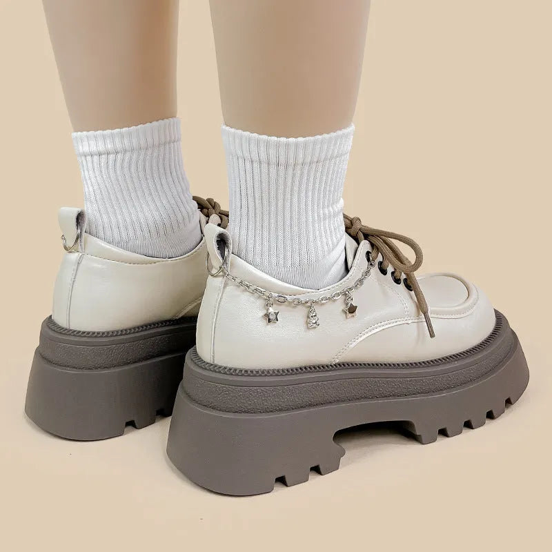 White platform leather shoes with chunky 6-8cm heels and Mary Jane style front lace-up design