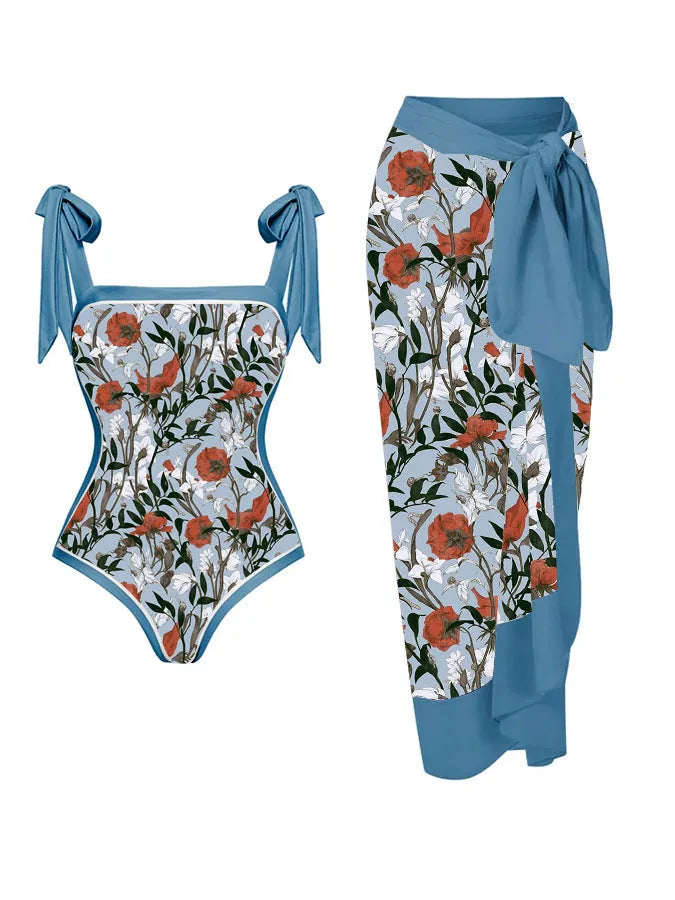 Women's floral print two-piece swimsuit with a sheer chiffon hip skirt, shown in one of the available colour variations.