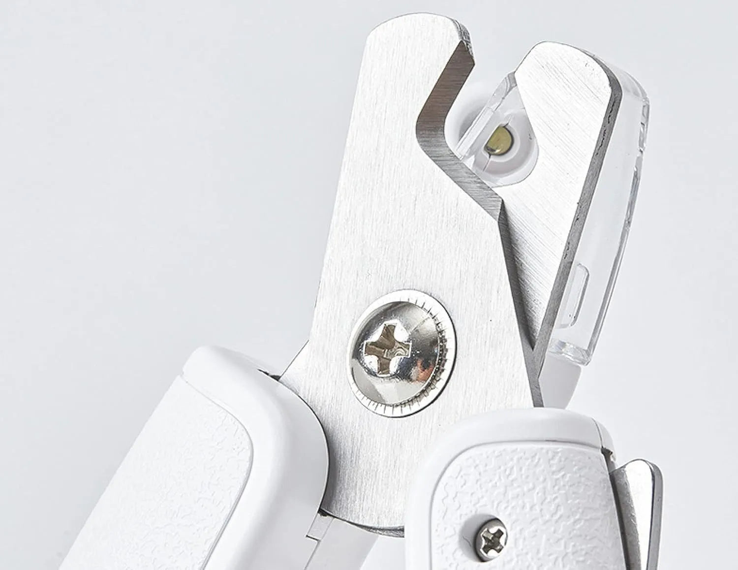 White pet nail clippers with LED light and transparent anti-splash guard for cats and dogs