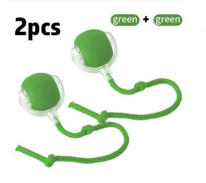 Silicone cat rolling ball toy in green, grey, red, and pink plush designs with optional rope attachment