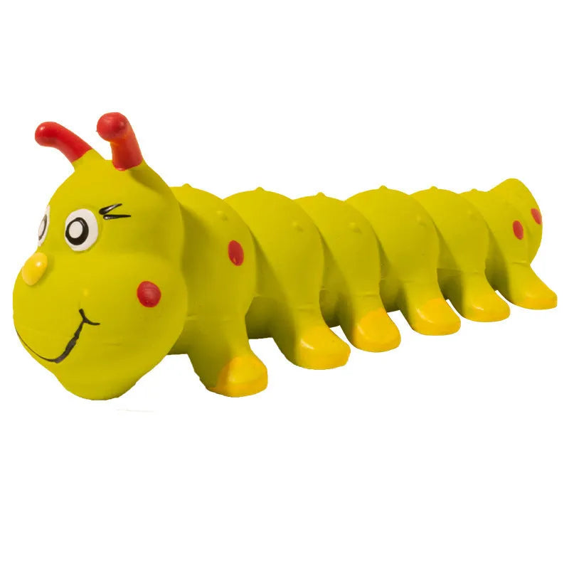 Yellow caterpillar-shaped rubber dog squeaky chew toy on a white background.