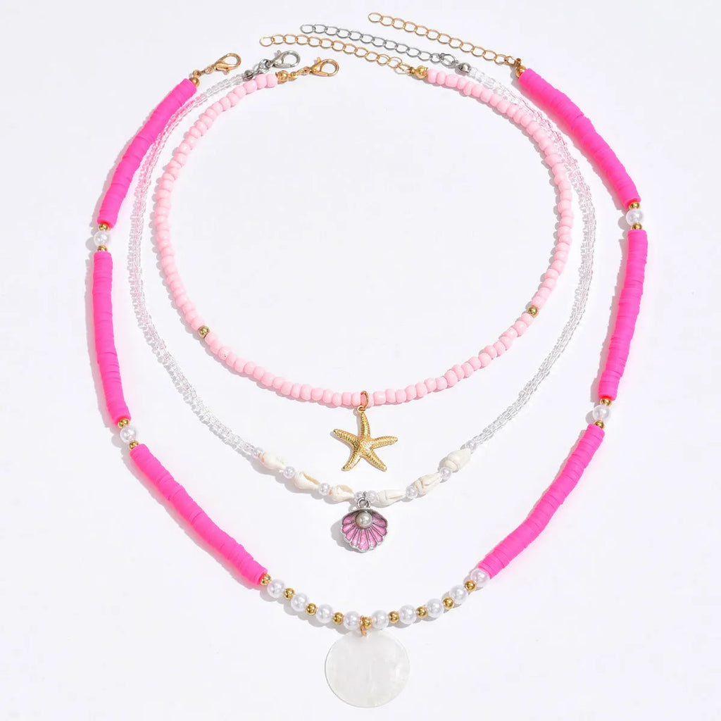 Polymer clay beaded necklace with multi-layer twin clavicle chain and geometric alloy pendant on female model