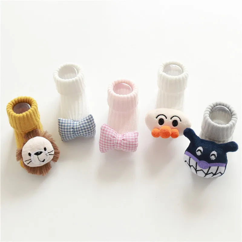 Cotton baby floor socks in various colours and patterns with size guide for ages 0-3 months