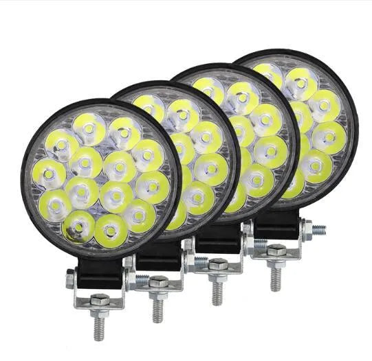 White mini round aluminium LED work light for car, truck, or boat with 42W power and IP67 rating.