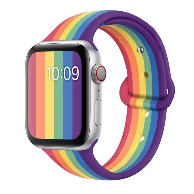 Silicone sports wristband with buckle closure in black, rainbow, or white colours
