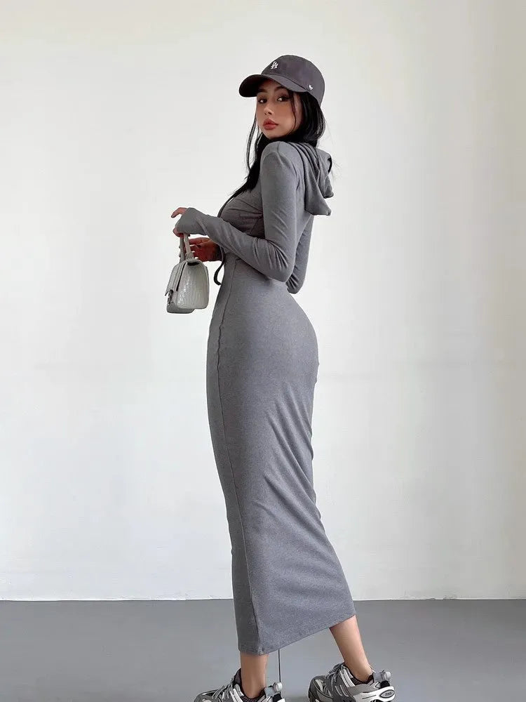 Women's grey hooded sheath dress with long sleeves and a high waist.