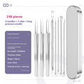 Four silver metal acne needles with ultra-fine pointed tips for skin treatment.