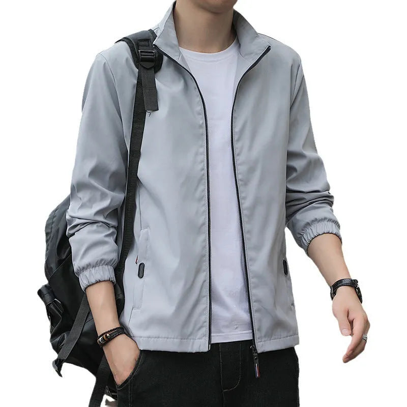 Korean style loose fit men's autumn jacket in black, shown with zip front and pockets