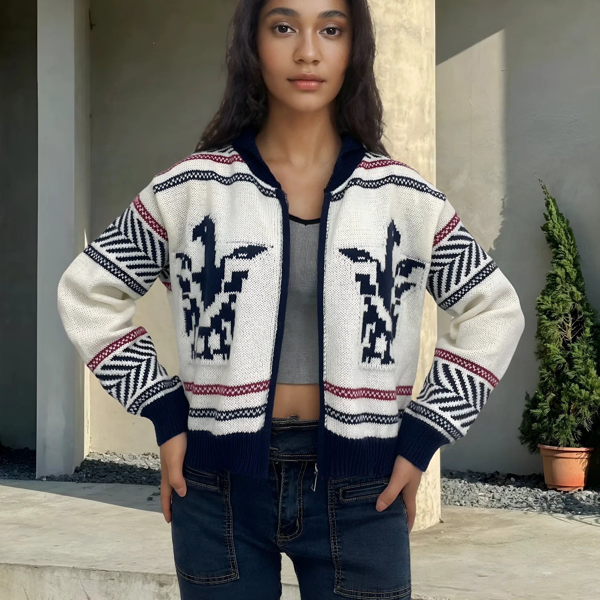 White women's zip cardigan with black contrast stripe jacquard pattern and lapel collar