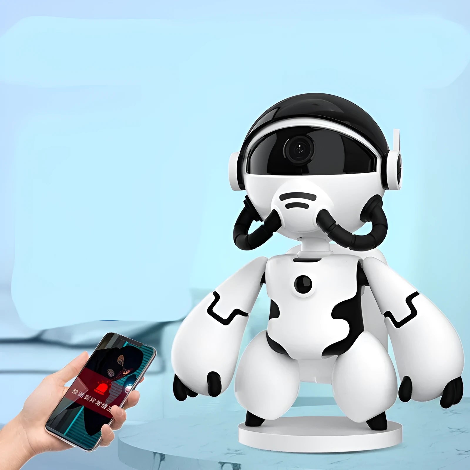White or black Space Robot home monitoring camera on a detachable base with anti-slip pads.