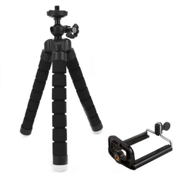 Black flexible octopus tripod with wrapped legs next to a smartphone, showing its 18cm size and universal screw mount.