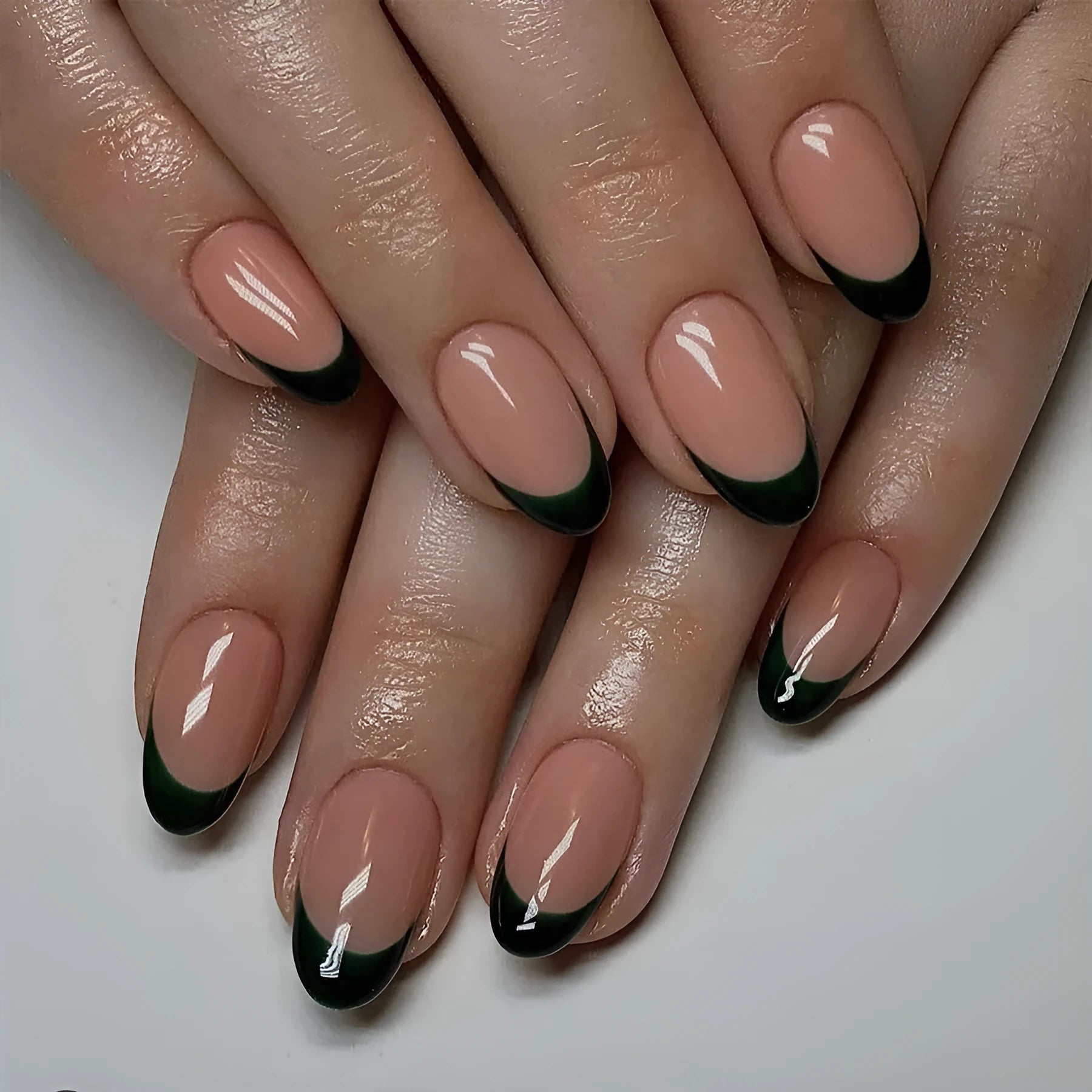 Black French-style manicure set showing 24 almond-shaped nail art pieces with J049 colour classification