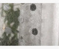 A single blackout curtain panel hung on a track, demonstrating its light-blocking fabric and hook-style header.