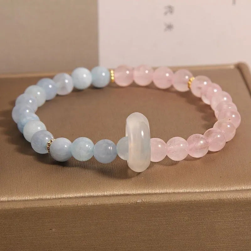 Women's aquamarine crystal bracelet with pink and blue dopamine colours, round geometric beads, handcrafted mixed materials