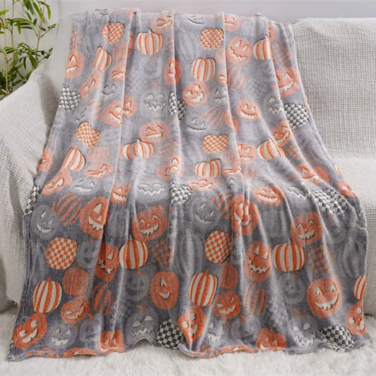 Colourful cartoon print children's flannel blanket, shown in two size options.