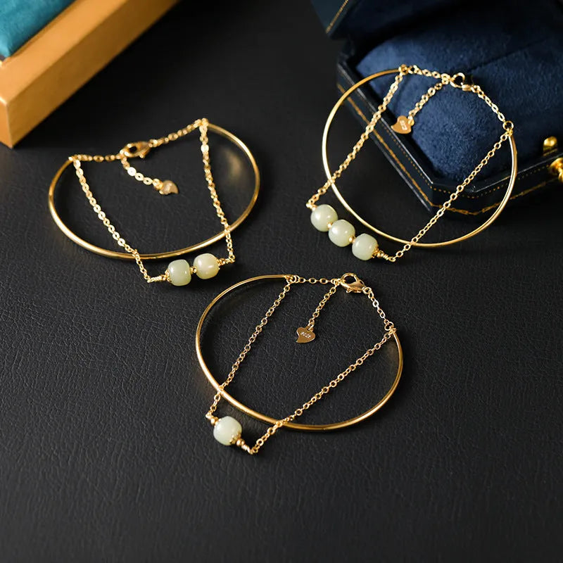 Women's Hetian jade lucky beads bracelet with gold inlay, shown in single, double, and three bead versions.
