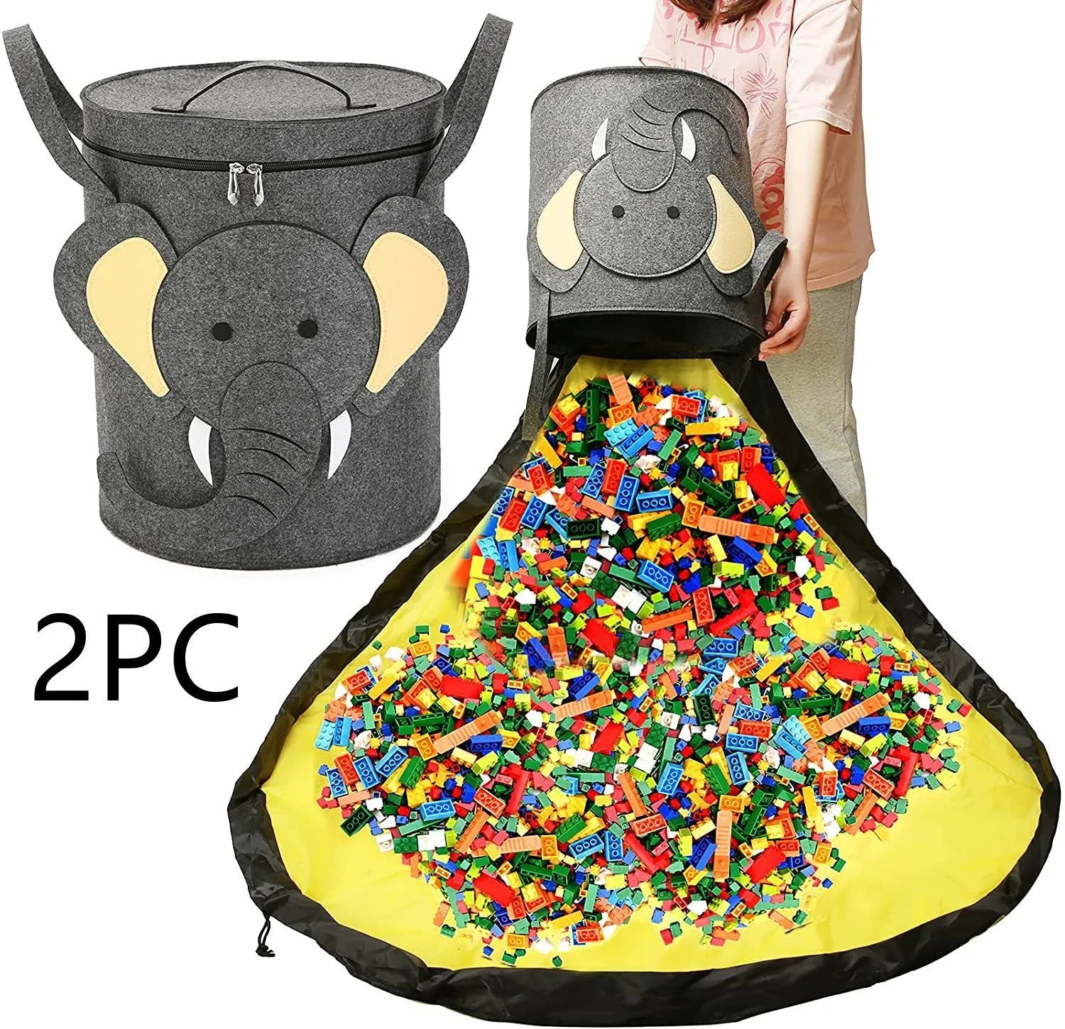 Green felt cube storage bag with pull rope, laid flat as a play mat for toys.