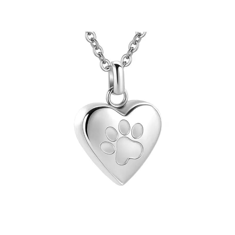 Simple openable heart casket necklace in titanium steel, shown on a chain.