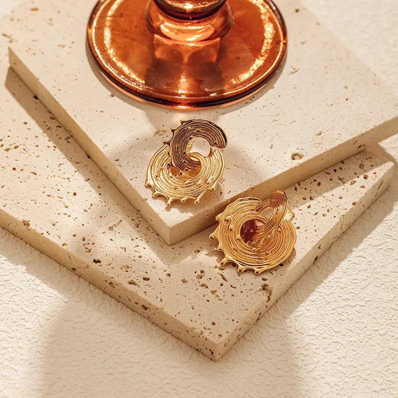 Irregular retro gold clip-on earrings with geometric water droplet design on copper base