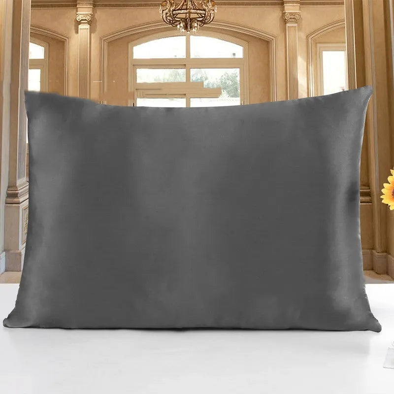 Double-sided silk pillowcase in apricot colour showing smooth satin weave texture.