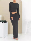 Women's polyester two-piece suit set with three-quarter sleeve top and long skirt in fresh sweet style