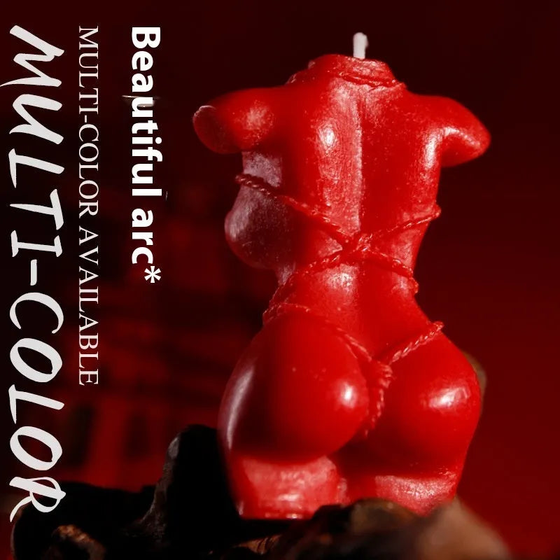 Soy wax low temperature massage candles in red, pink, and purple colours.