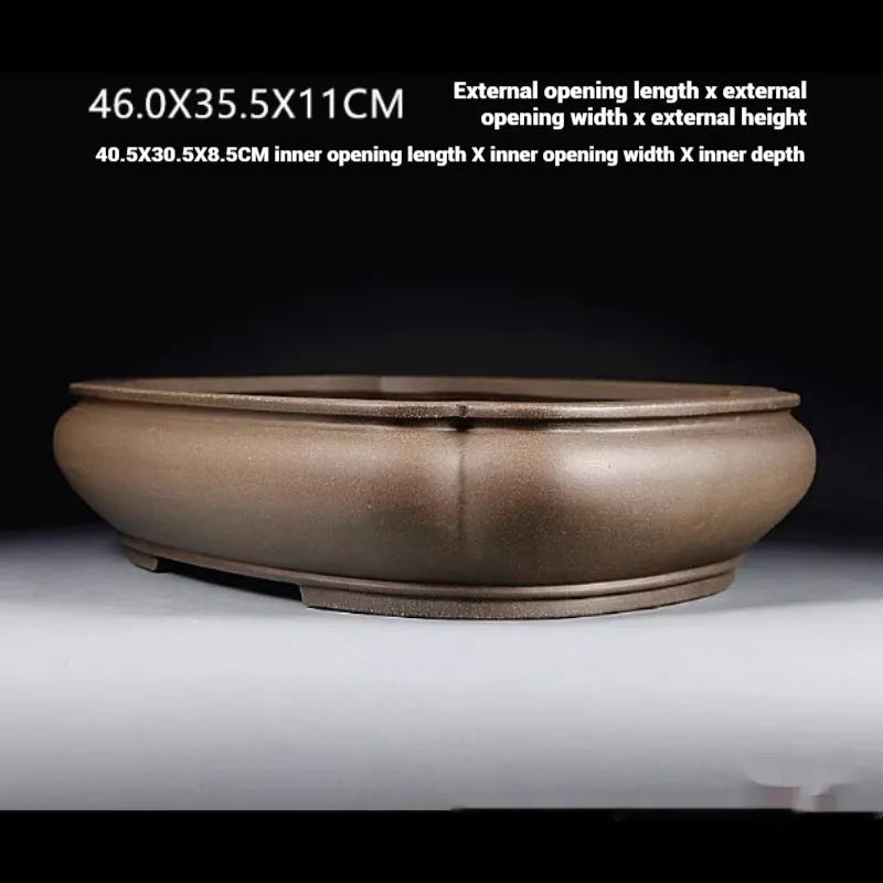 Handmade purple clay papaya-shaped flower pot measuring 46cm long with antique Pukou design