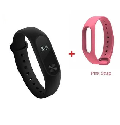 Black Xiaomi Mi Band 2 fitness tracker on wrist showing OLED display with heart rate reading