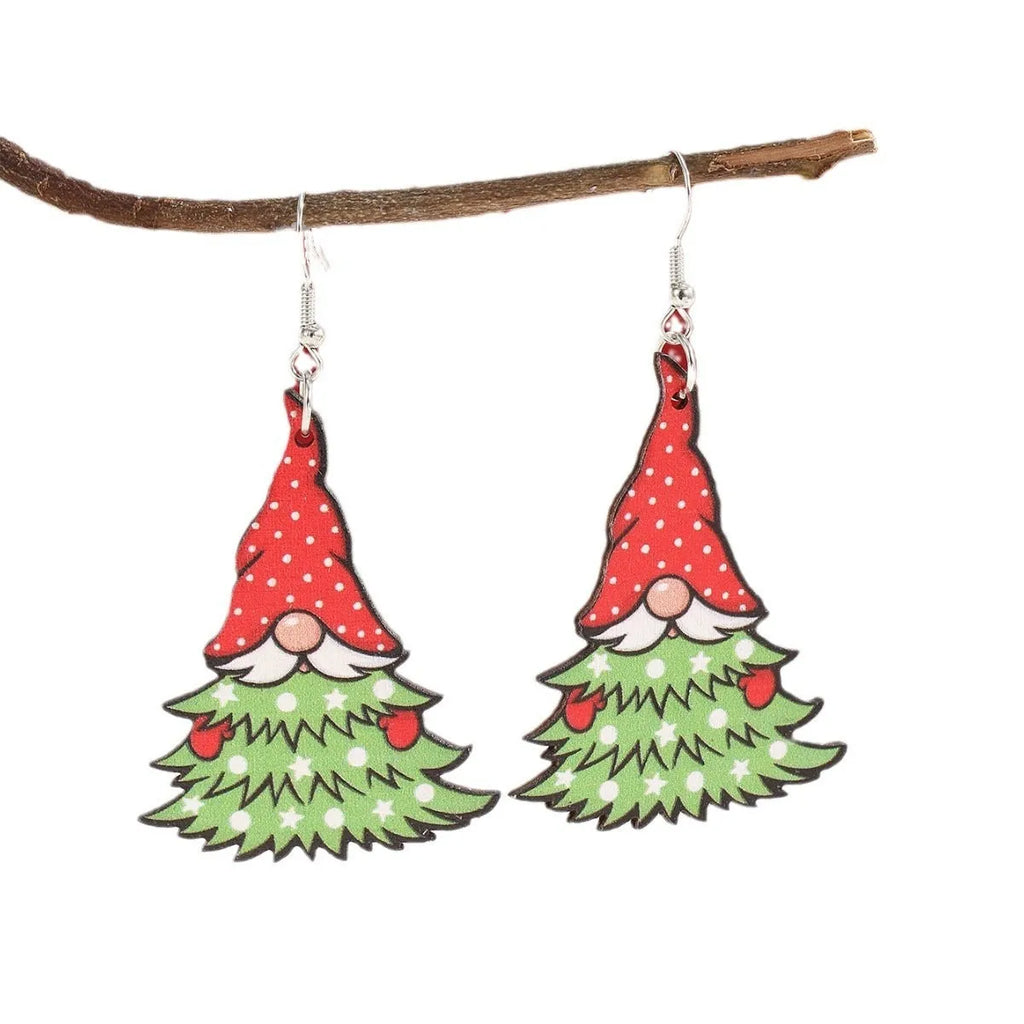 Wooden Christmas earrings with geometric tree and snowman designs featuring Santa Claus elements