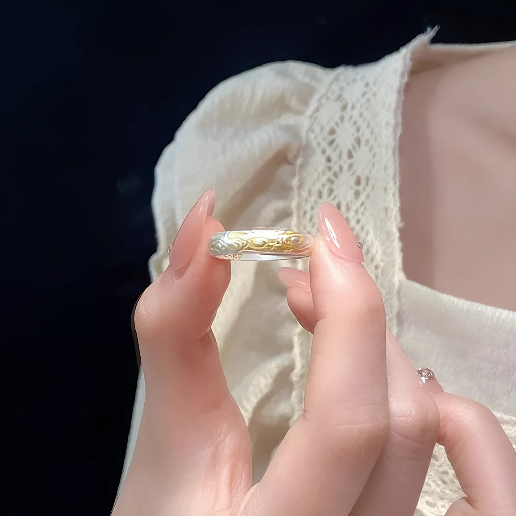 Geometric open mouth ring with Xiangyun pattern in electroplated silver and gold finish on white copper
