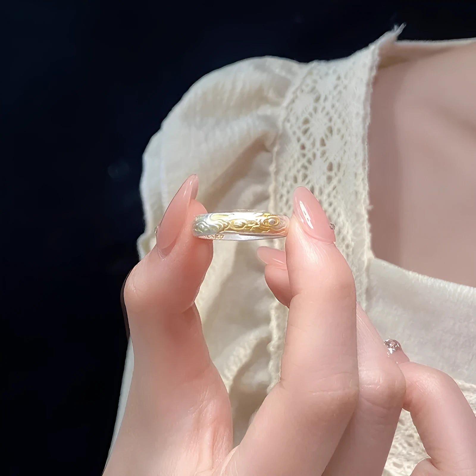 Geometric open mouth ring with Xiangyun pattern in electroplated silver and gold finish on white copper