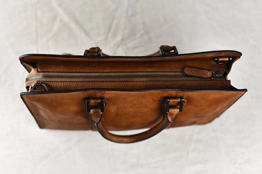 Men's horizontal leather handbag in vegetable tanned cowhide with 14 inch laptop compartment